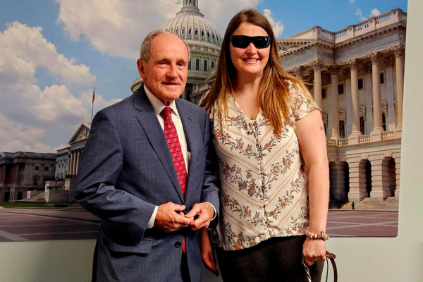 Envision Employees Advocate for BVI Employment Growth with National Industries for the Blind Marybeth Clare standing with Idaho Senator.