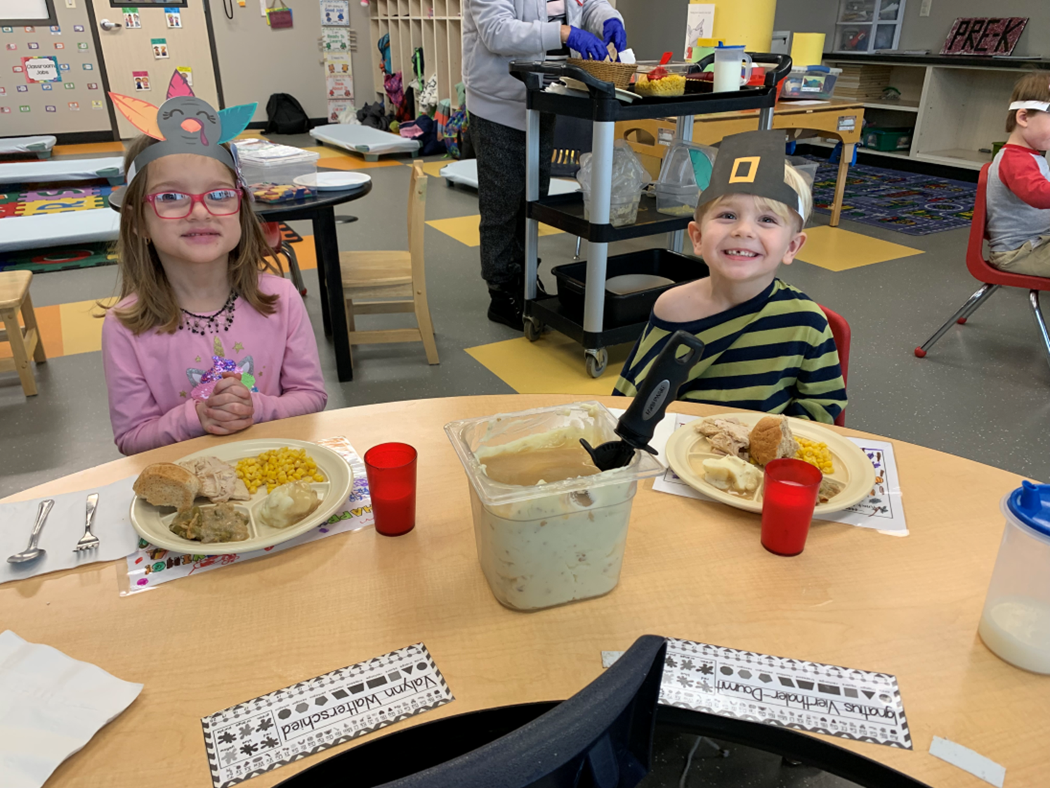 ECDC Monthly Recap- November 2021 Valynn Walterscheid, Ignatius Vierthaler-Doumit enjoying lunch during ECDC’s Thanksgiving celebratio