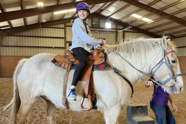 Youth Thrive at 2nd Annual Heathers Camp Trailblazers Weekend A young girl on a horse.