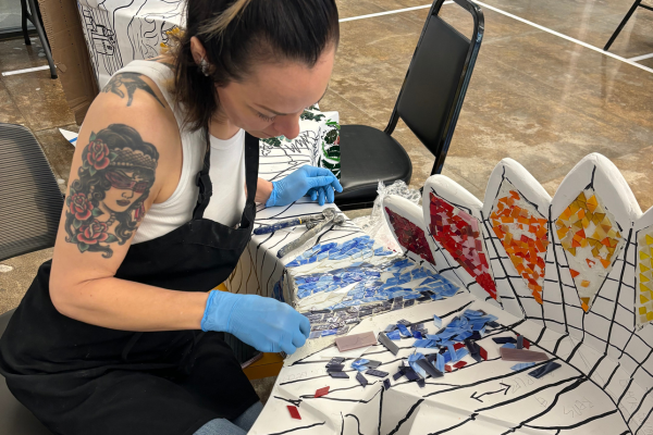 Sarah adding stained glass onto the Keeper.