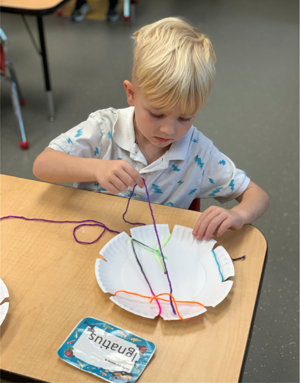 Ignatius-and-spider-web.png The Preschool classroom’s 4-H lesson in October was about spiders and their webs. Ignatius worked hard creating his own web.