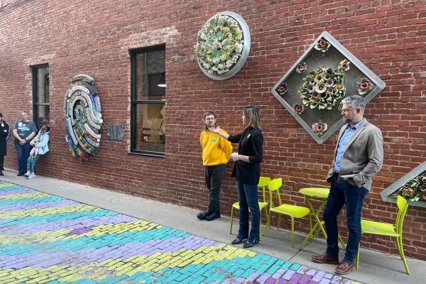 Sarah, Dale and Jason speaking to the crowd.