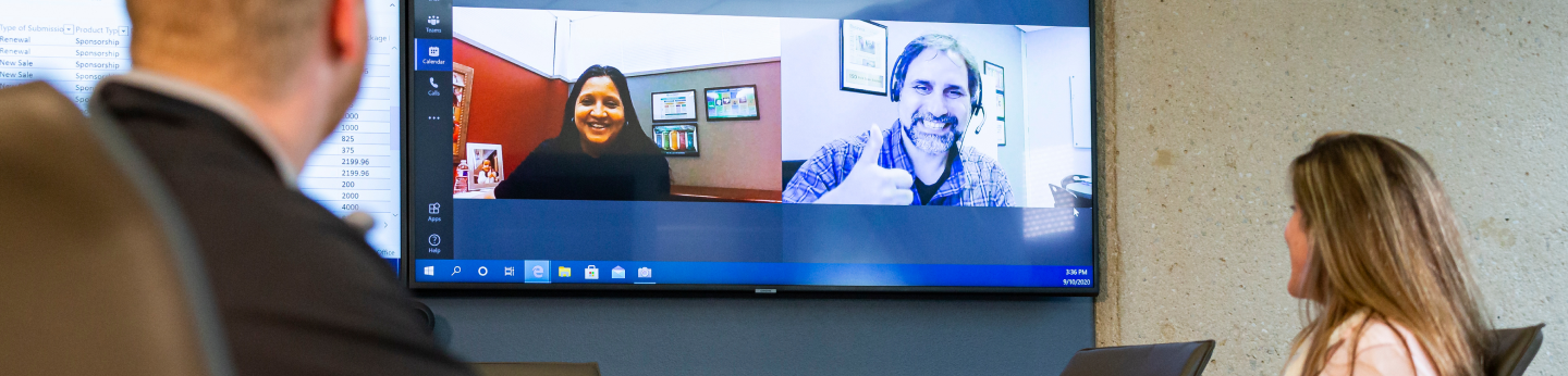 Envision employees having a virtual team meeting.