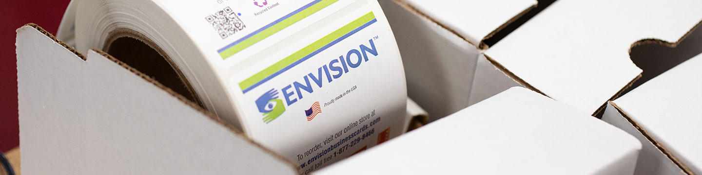 close up shot of boxes containing Envision shipping labels