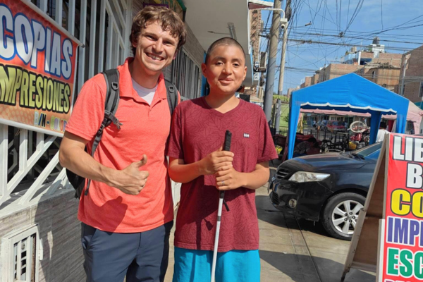 Bridging the Gap: Bringing Low Vision Rehabilitation to Peru Taylor with one of his patients in Peru.