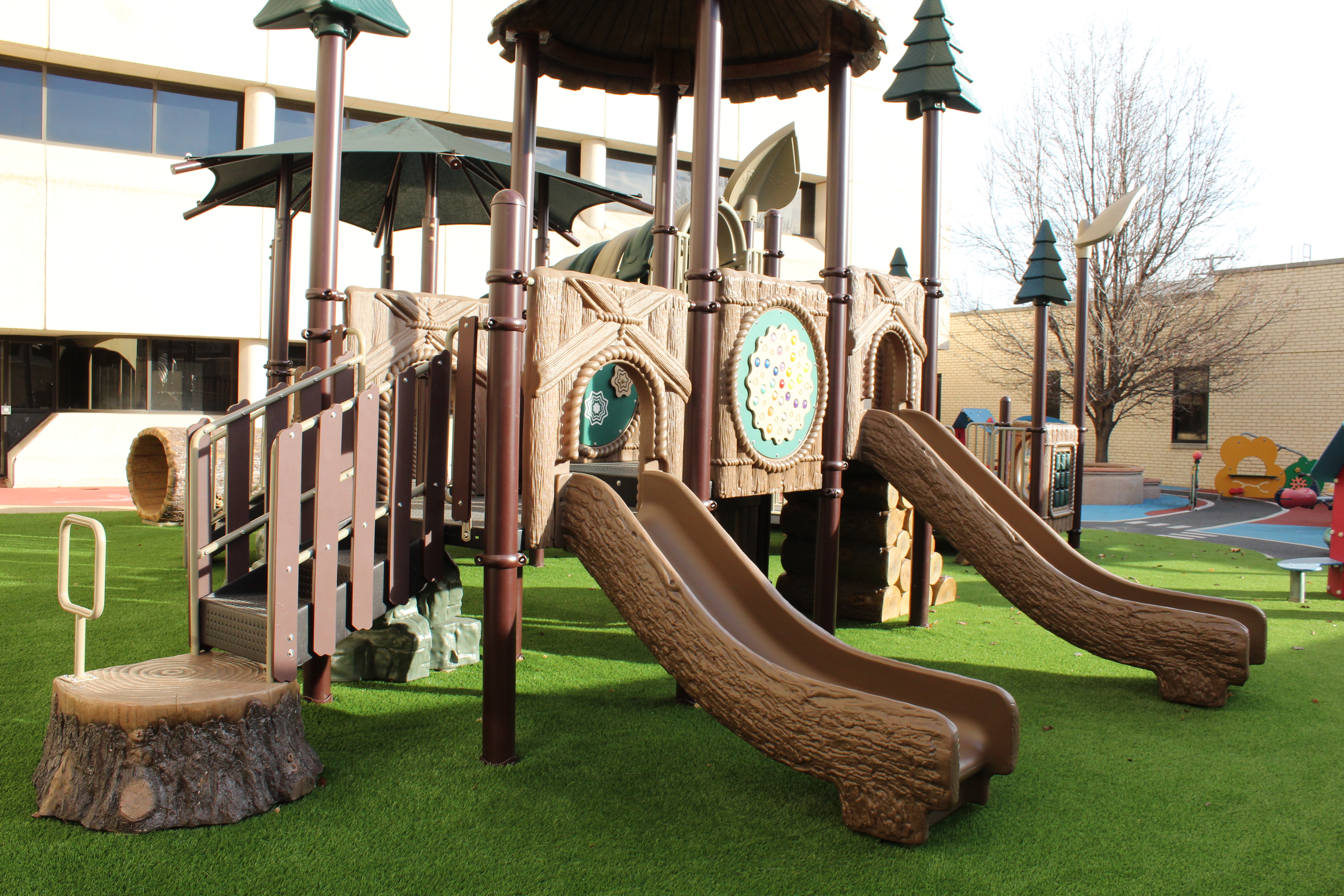 A side view of the playground that shows the built in slides.