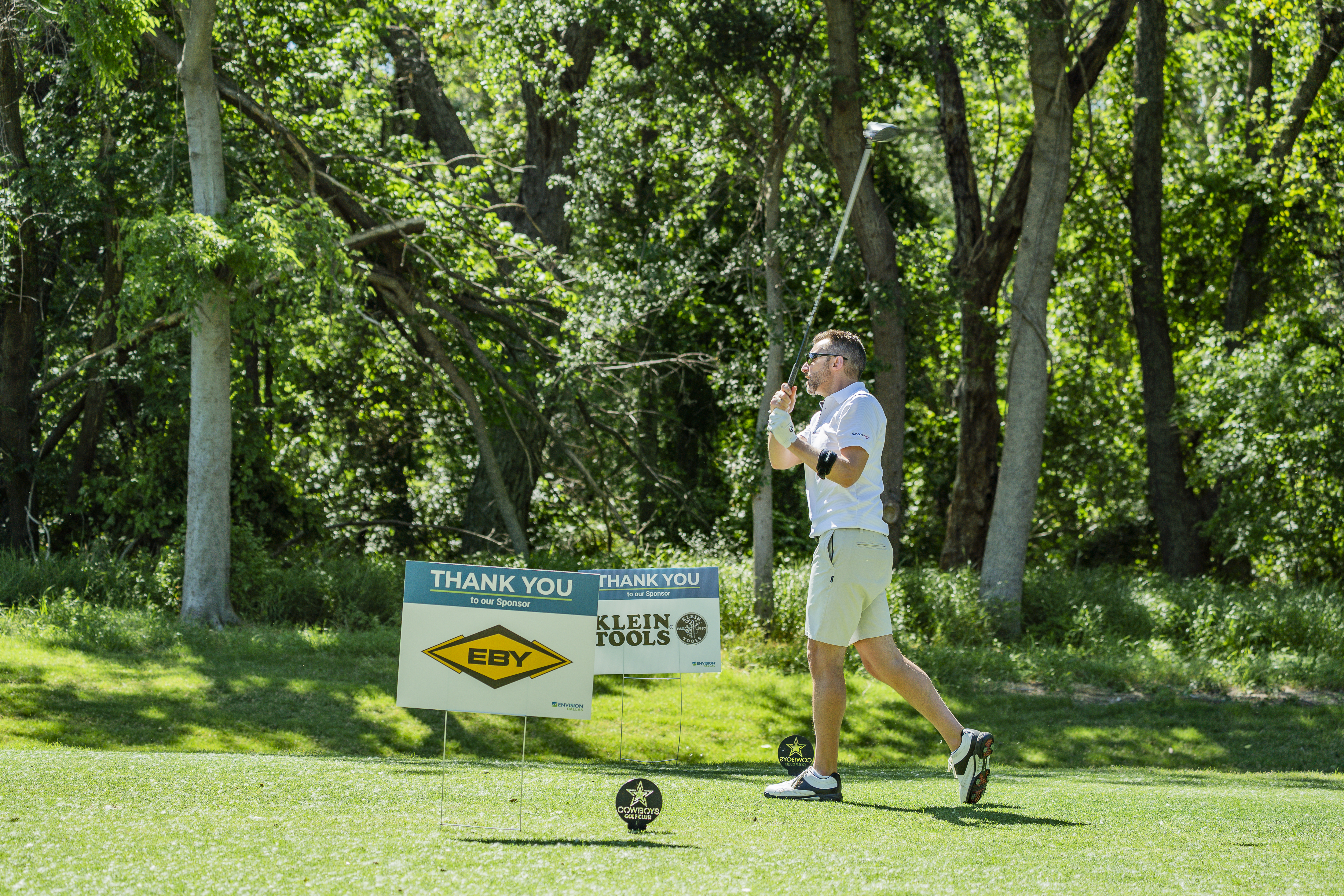 A golfer swinging a club