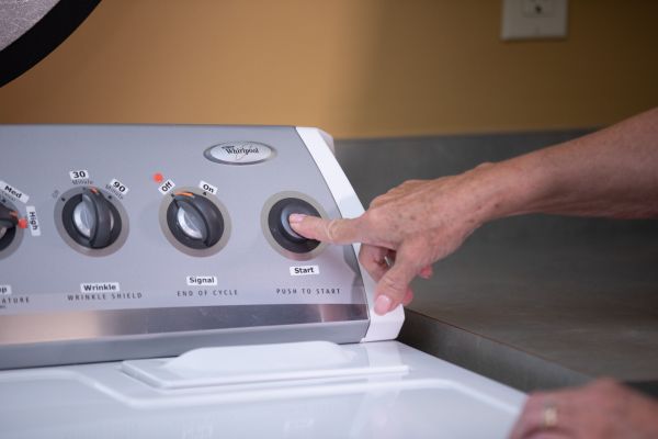 A close up showing bump dots being used on a washer and dryer.
