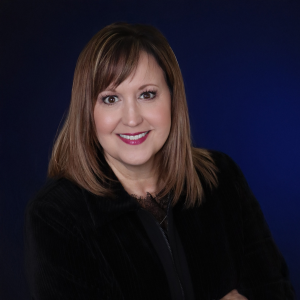 A headshot of Molly.