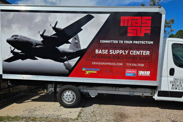 Elevating Partnerships at Envision Xpress Peterson Space Force Base The new vehicle wrap on an xpress truck.