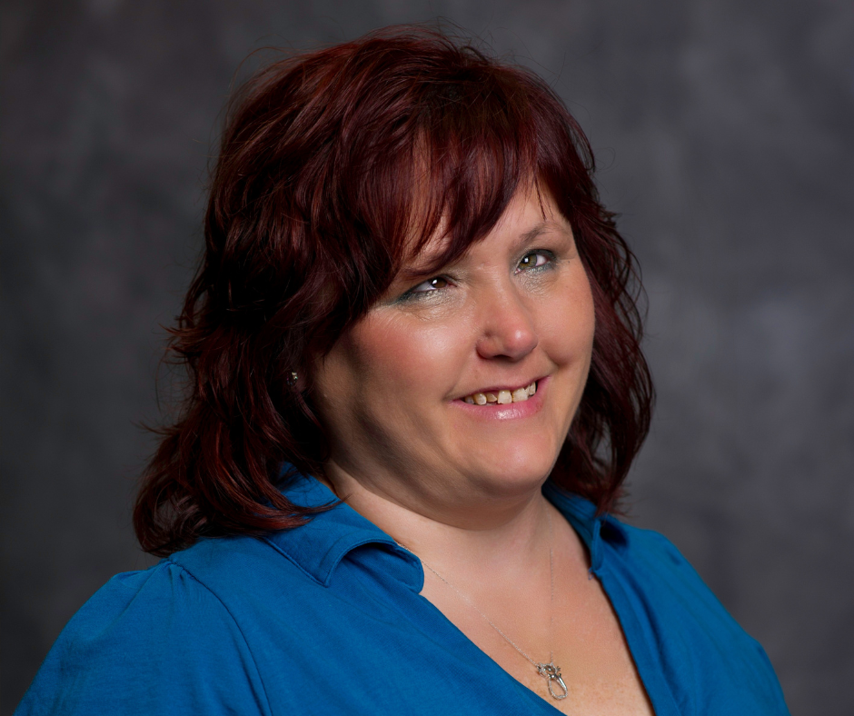 Terese headshot image, smiling at the camera.