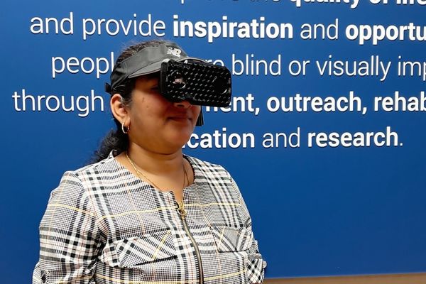 Sarika models one of her augmented reality head-mounted displays 