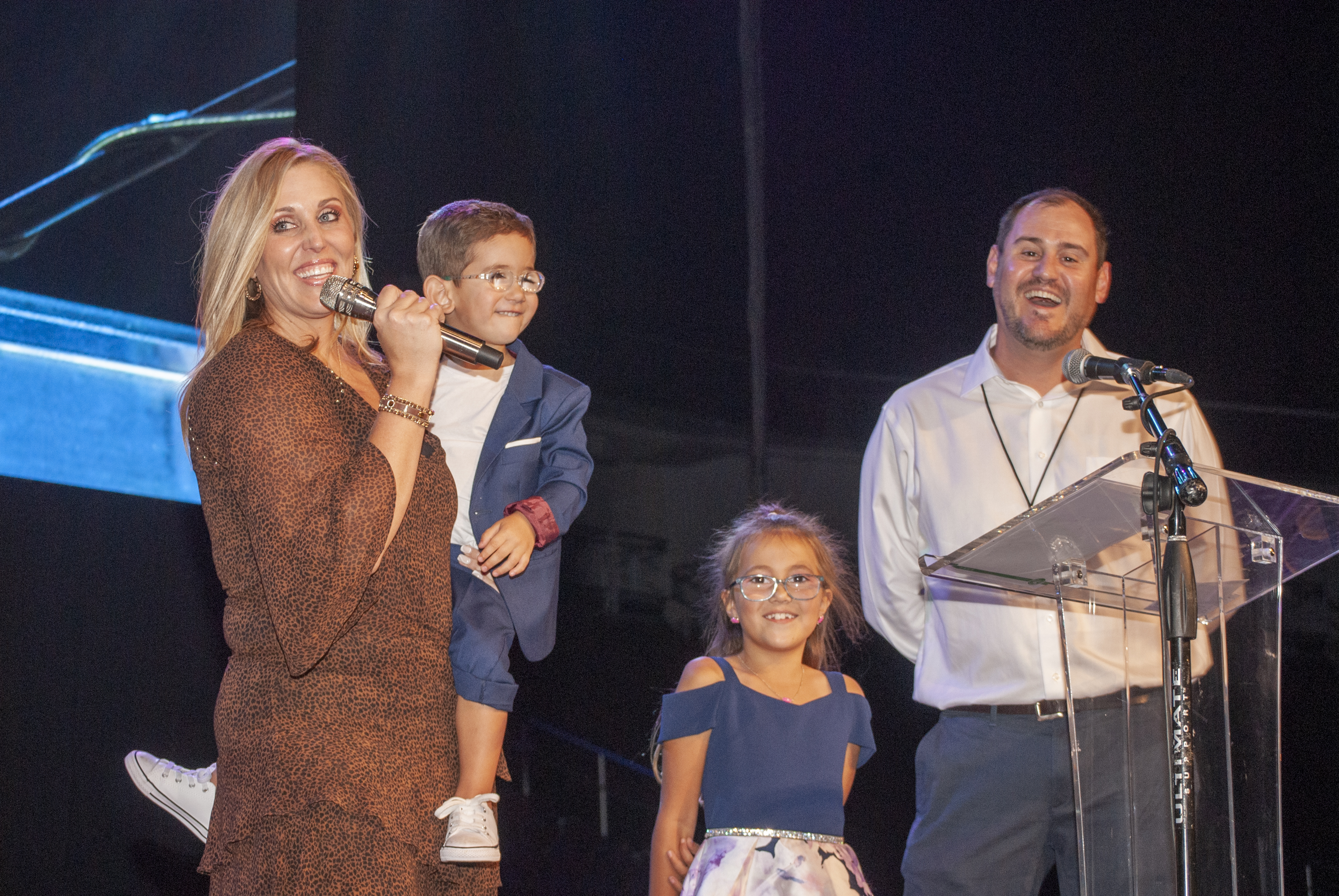 Carter and family on stage during the gala
