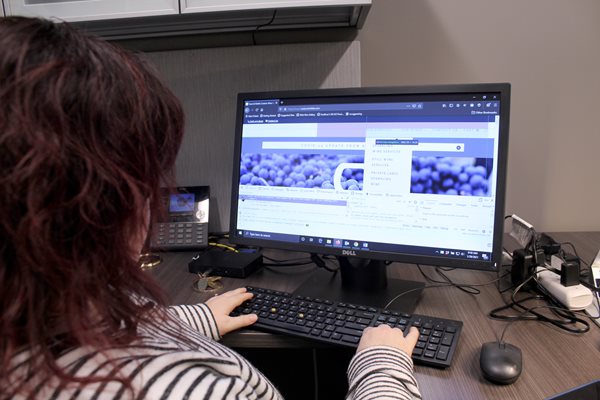 Terese Goren, Assistive Technology Specialist, tests a website for accessibility.