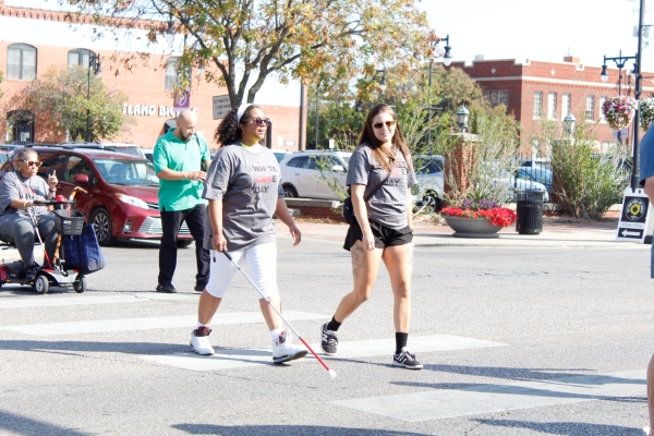 Roshunda and Jordan participate in the White Cane Day walk in downtown Wichita.