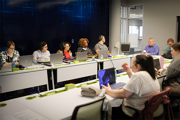 Participants learn new skills on the computer at the Workforce Readiness Bootcamp