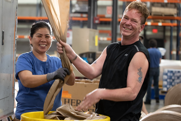 Manufacturing employees who are visually impaired work in the bag department in Wichita, Kansas.