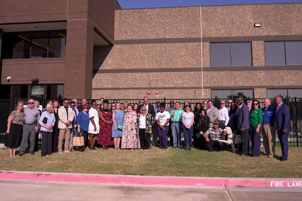 Community members gather infront of the Dallas ECDC.