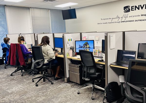 Three women working in call center in Dallas