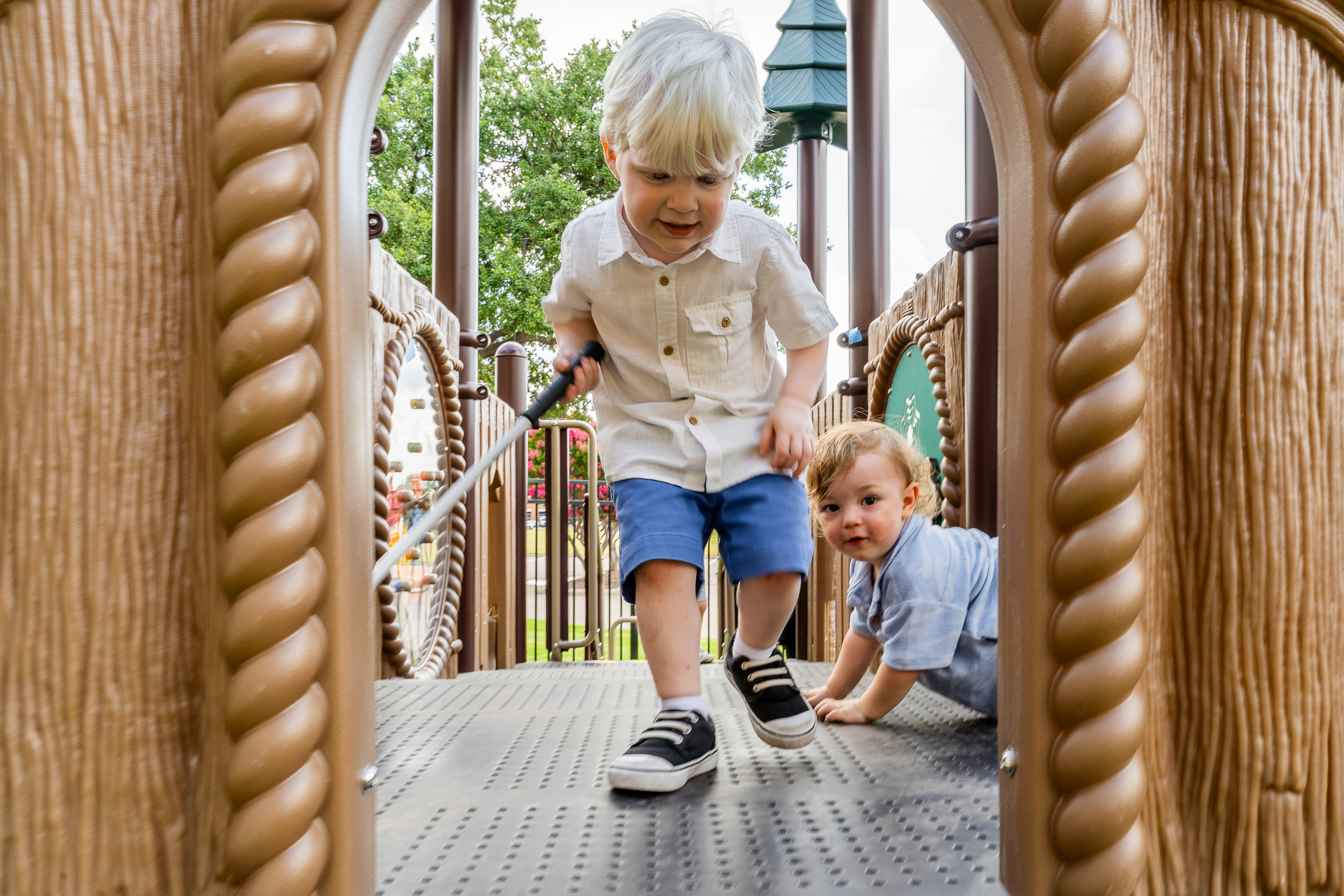 two children playing at the Envision Childhood Development Center playground