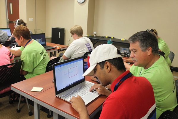 Umer working on a computer during tech labs