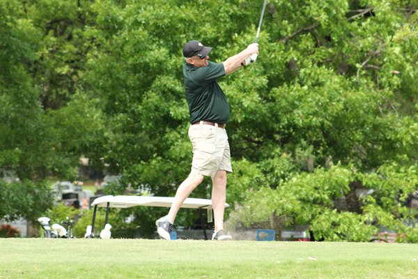 Golfer swings at Dallas golf tournament
