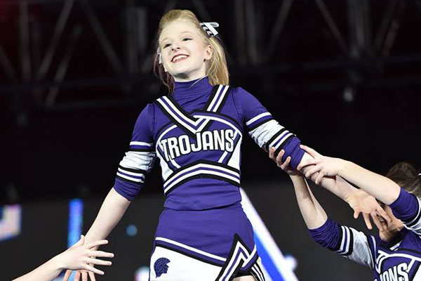 Contacts Now Allow Envision Teen to ‘Enjoy Doing Things that Everyone Else Does’ Rondalee Winship in action while cheerleading