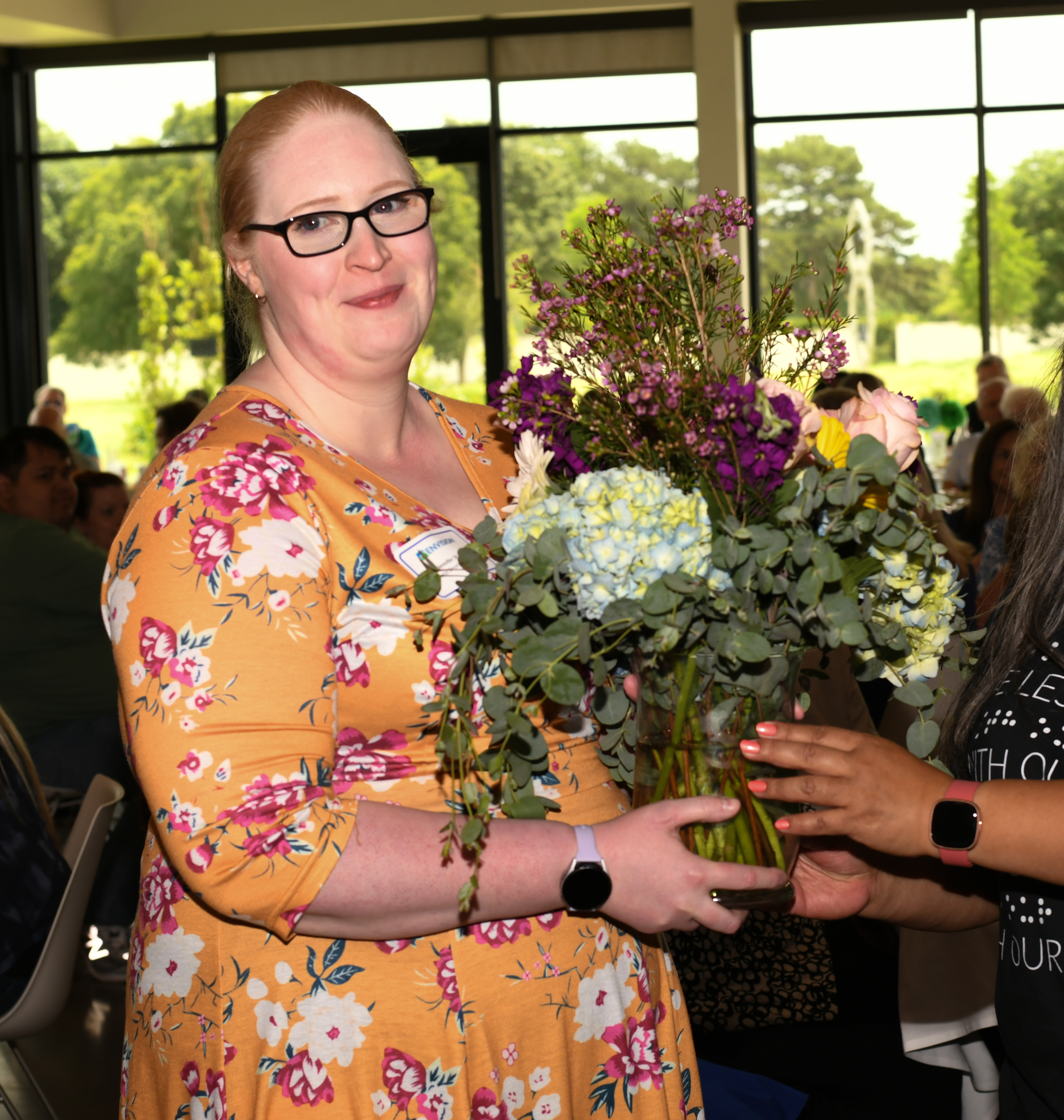 Jennifer holding flowers