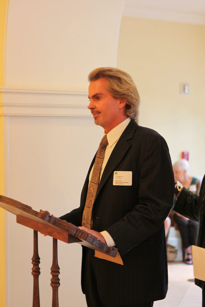 Photo of Blake Lindsay speaking at podium